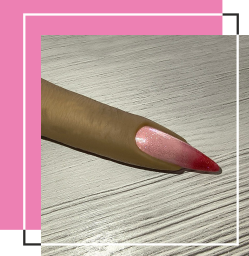 Ombre nails in nude base color with red tops