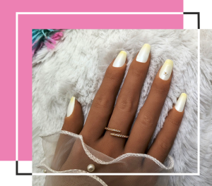 White pearl nails with gradient light yellow tops